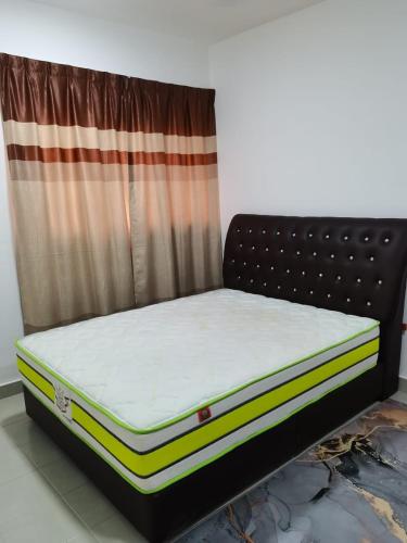 a mattress sitting on top of a bed in a room at Casa D’Bayu in Kampong Alor Gajah