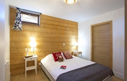Ένα ή περισσότερα κρεβάτια σε δωμάτιο στο Résidence Sorbier by Leavetown Vacations