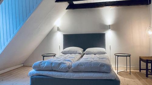 Gulta vai gultas numurā naktsmītnē ApartmentInCopenhagen Apartment 1571
