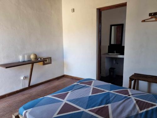 MOTEL M1 tesisinde bir odada yatak veya yataklar