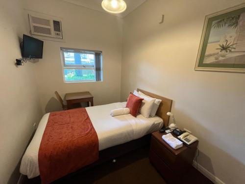 Katil atau katil-katil dalam bilik di Princes Lodge Motel