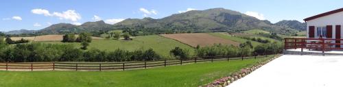 a rendering of a farm with mountains in the background at Pena plata in Sare