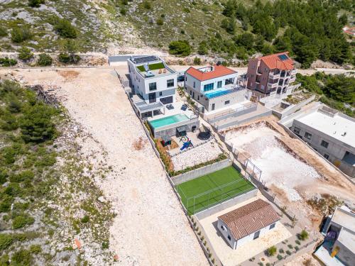an aerial view of a house with a yard at Villa GRC in Zaboric