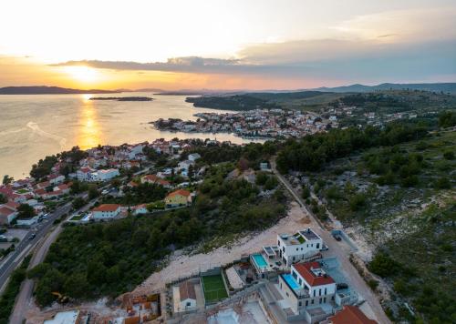 an aerial view of a town next to the water at Villa GRC in Zaboric