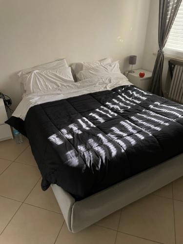 Ένα ή περισσότερα κρεβάτια σε δωμάτιο στο alloggi Turri