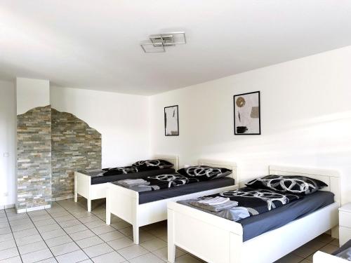 Postel nebo postele na pokoji v ubytování Schöne Apartments I private Parkplätze I home2share
