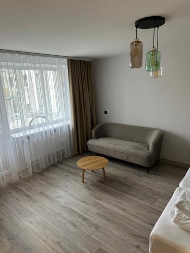 Χώρος καθιστικού στο NERO apartamentai