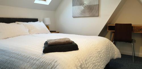 Postel nebo postele na pokoji v ubytování Comfort Stay Sussex 5-bed