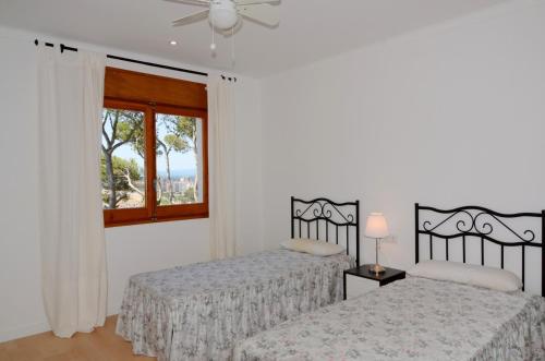 Ένα ή περισσότερα κρεβάτια σε δωμάτιο στο Apartamento FRITZ