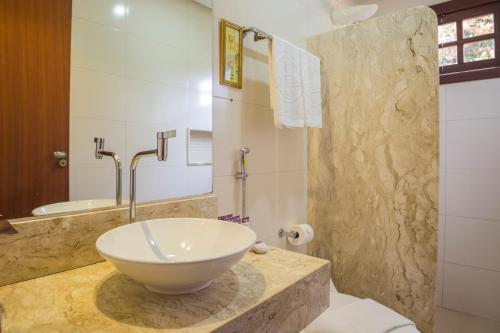 Um banheiro em Terra dos Diamantes Hotel