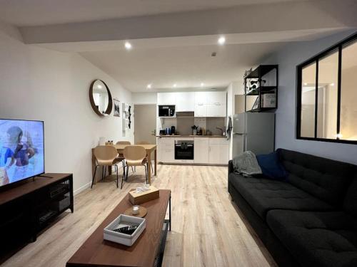 Dapur atau dapur kecil di Appartement central - L'ouest