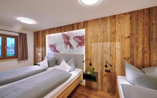 Ein Bett oder Betten in einem Zimmer der Unterkunft Urlaubsbauernhof Kirchmaier