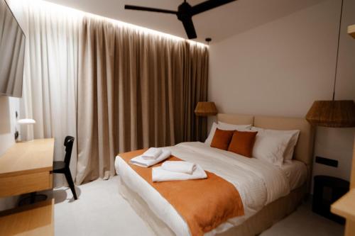 A bed or beds in a room at Deos- Luxury Apartment in Agrinio