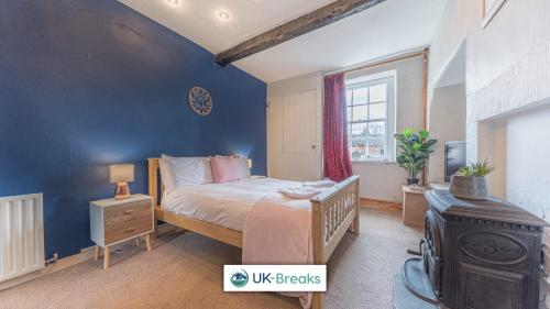 Katil atau katil-katil dalam bilik di Historic Farmhouse in St Bees Pet friendly