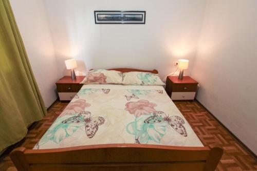 Postel nebo postele na pokoji v ubytování Apartment Sarita