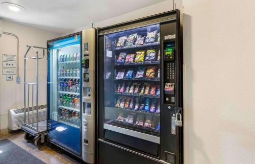 a vending machine filled with drinks and drinks at Extended Stay America Select Suites - Akron - South in Portage Lakes