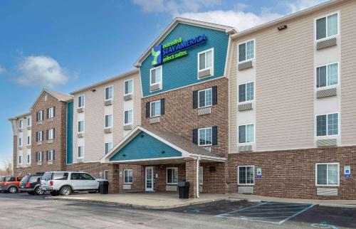 a rendering of a hotel with cars parked in a parking lot at Extended Stay America Select Suites - Indianapolis - West in Avon