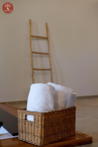 a basket of paper towels sitting on a table at I SECOLARI in Sannicandro di Bari