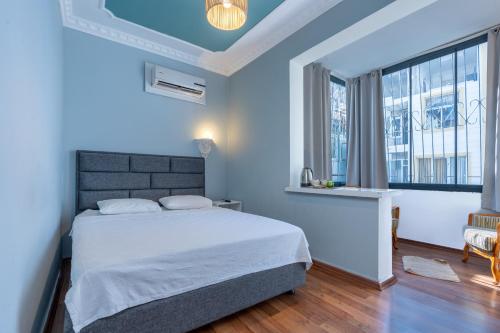 Ένα ή περισσότερα κρεβάτια σε δωμάτιο στο Antalya B&B Hotel