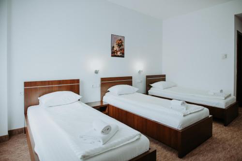 Ένα ή περισσότερα κρεβάτια σε δωμάτιο στο Hotel Select