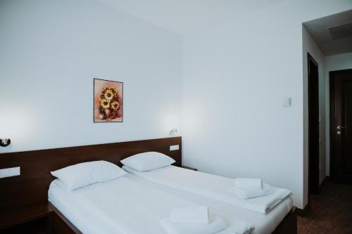 Ένα ή περισσότερα κρεβάτια σε δωμάτιο στο Hotel Select