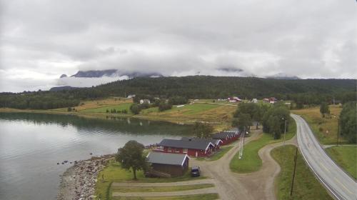 an aerial view of a village next to a lake at Base Camp Hamarøy in Sørkil