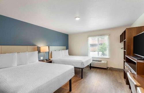 Ένα ή περισσότερα κρεβάτια σε δωμάτιο στο Extended Stay America Suites - Denver - Centennial