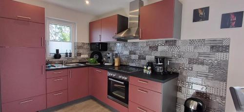 Kuchyň nebo kuchyňský kout v ubytování Premiumferienhaus Prana