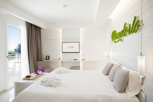 Letto o letti in una camera di San Lorenzo Boutique Hotel & SPA