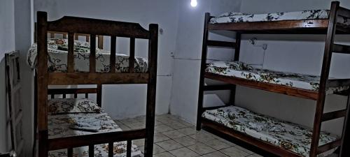 Μία ή περισσότερες κουκέτες σε δωμάτιο στο Cantinho da Sereia