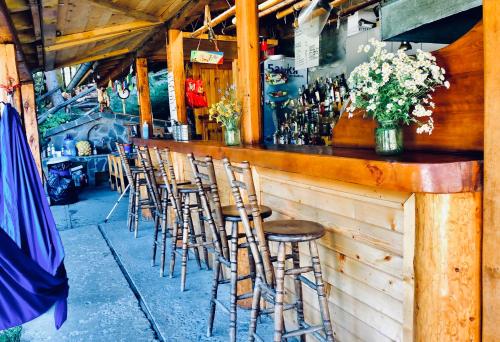 a group of stools sitting at a bar at Malka Yurta Hut in Panichishte