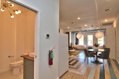a kitchen and dining room with a table and chairs at Wonder Loft A3 - Main St. Honesdale in Honesdale