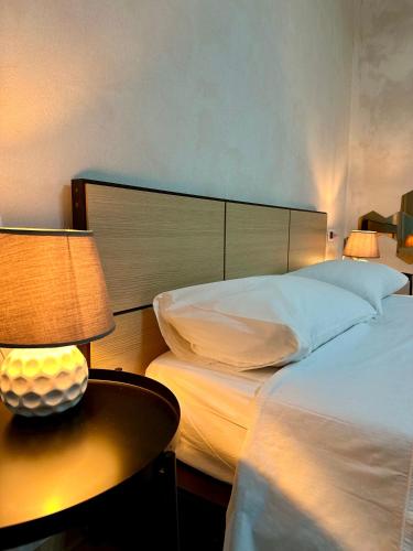 Una cama o camas en una habitación de CASAVACANZETOFFEE