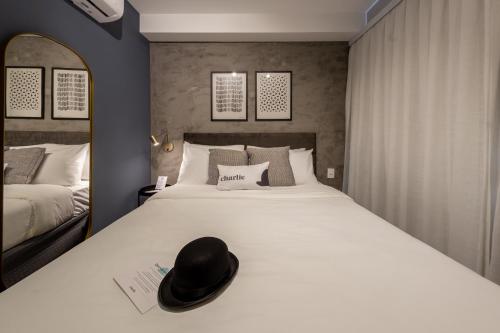Cama o camas de una habitación en Charlie Nik Vila Mariana