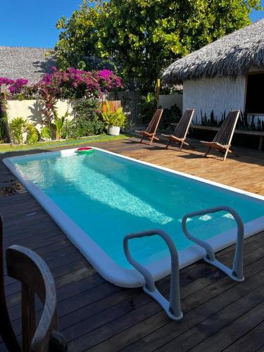 Kolam renang di atau dekat dengan suite com ar-condicionado na Fullhausi Fortim