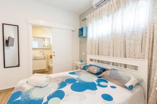 Postel nebo postele na pokoji v ubytování One Suite 508