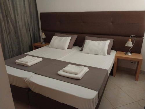 Ένα ή περισσότερα κρεβάτια σε δωμάτιο στο Solaren Apartments Boavista
