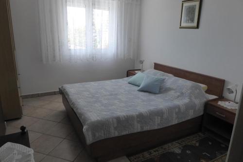 Posteľ alebo postele v izbe v ubytovaní Apartment Dramalj (3322)