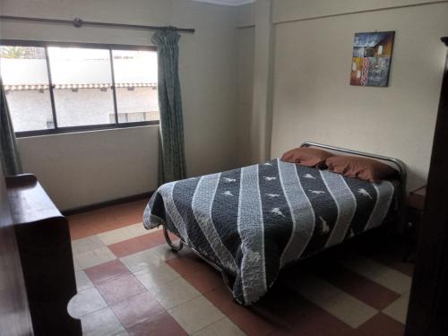 Ένα ή περισσότερα κρεβάτια σε δωμάτιο στο APARTAMENTO, CENTRO DE LA CUIDAD