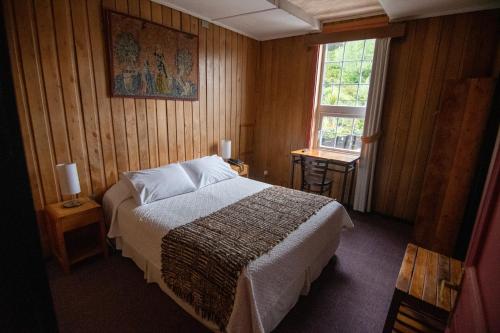 Un ou plusieurs lits dans un hébergement de l'établissement Hotel Unicornio Azul