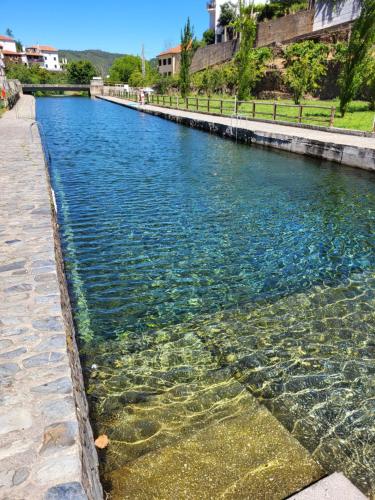 a pool of water in a canal at Free Spirit in Vale do Torno