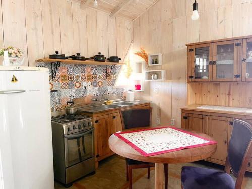 Una cocina o zona de cocina en Casa no sítio