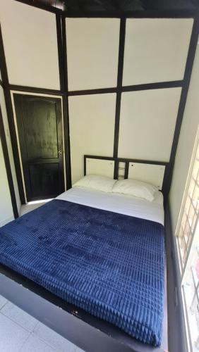 Un pat sau paturi într-o cameră la CHALET LA PROMESA