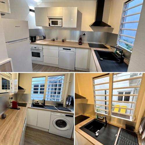 une cuisine avec des armoires blanches et un évier dans l'établissement Appartement moderne et lumineux T4 front de mer, à Sainte-Anne