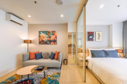 Katil atau katil-katil dalam bilik di Sindhorn Midtown Hotel Bangkok, Vignette Collection by IHG