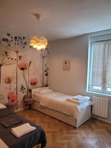 Cama o camas de una habitación en Logement de Ville 4 chambres proche de Lille