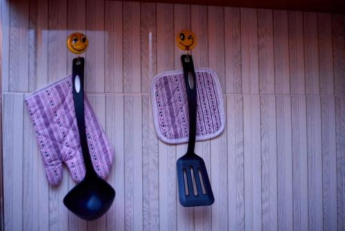 two utensils and a napkin and a fork and knife at Kilimanjaro poa in Moshi