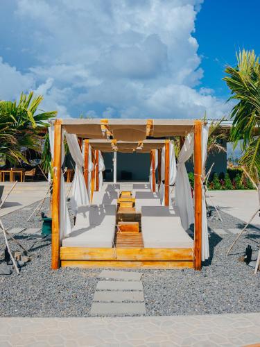 a set up for a destination wedding on the beach at Summer Bay Beach Club & Cabins Sihanoukville by Preference in Sihanoukville
