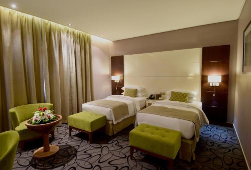 Säng eller sängar i ett rum på Hayat Heraa Hotel