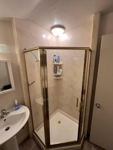 a bathroom with a shower and a sink at Startup House Palo Alto in Palo Alto